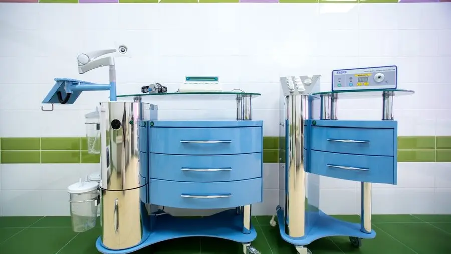 Aesthetic treatment equipment carts inside a clinic room
