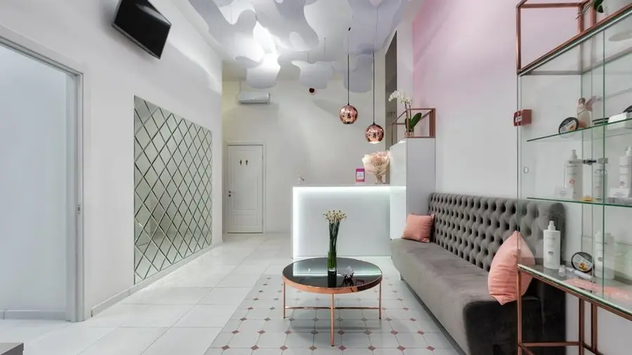 Reception lounge with seating at a modern aesthetic clinic