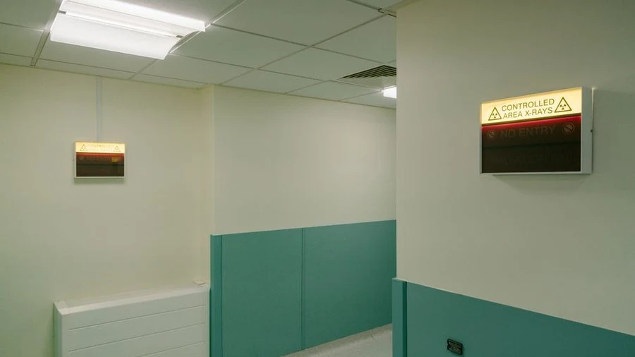 Modern shopping mall corridor in Petaling Jaya with clinic signage