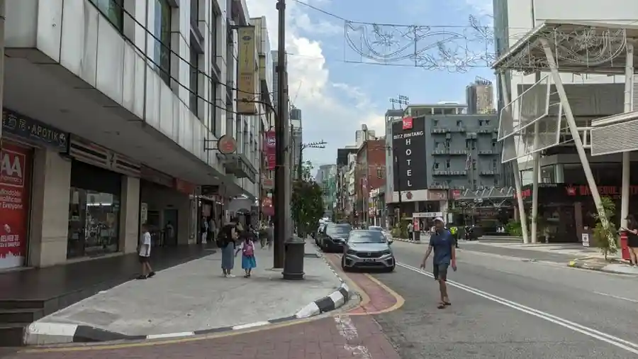 City street scene in Kuala Lumpur near shopping and beauty outlets