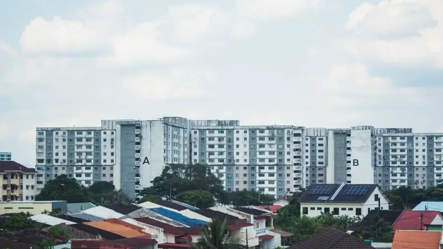Suburban Malaysian neighbourhood of apartment blocks and terrace houses