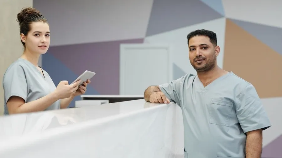 Clinic staff in a hallway at a modern aesthetic clinic