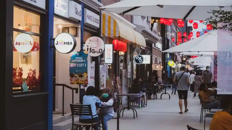 Pedestrian lane with cafes and shopfronts in Kuala Lumpur