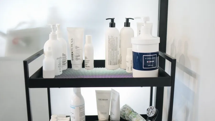 Trolley of professional skincare products in a treatment room