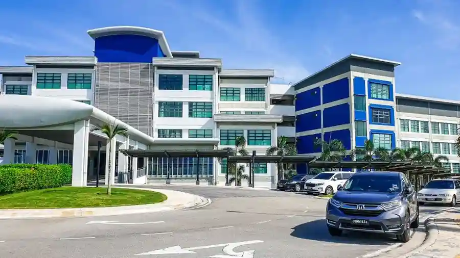 Modern hospital building with a landscaped entrance in Malaysia