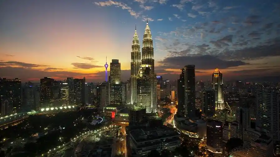 Twilight view of the Kuala Lumpur skyline with the Petronas Towers