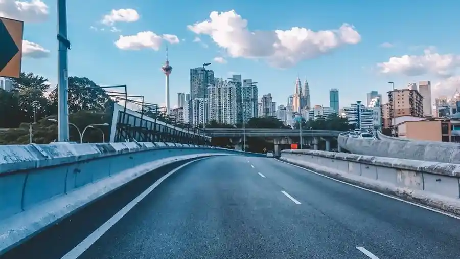 Kuala Lumpur city skyline seen from an elevated road