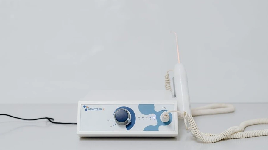 EMS body contouring device with paddles on a treatment cart