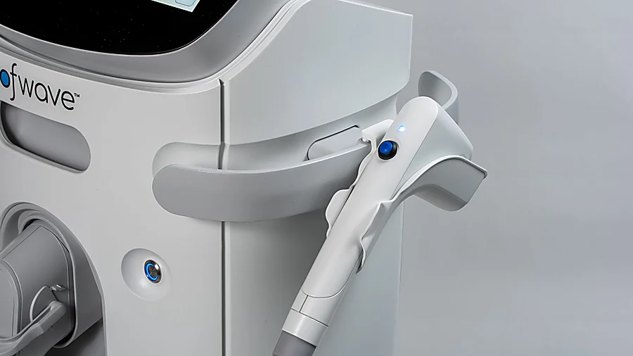Close-up of an ultrasound-based facial device handpiece