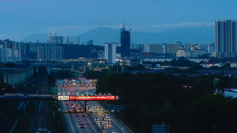 Klang Valley highway and city skyline at dusk