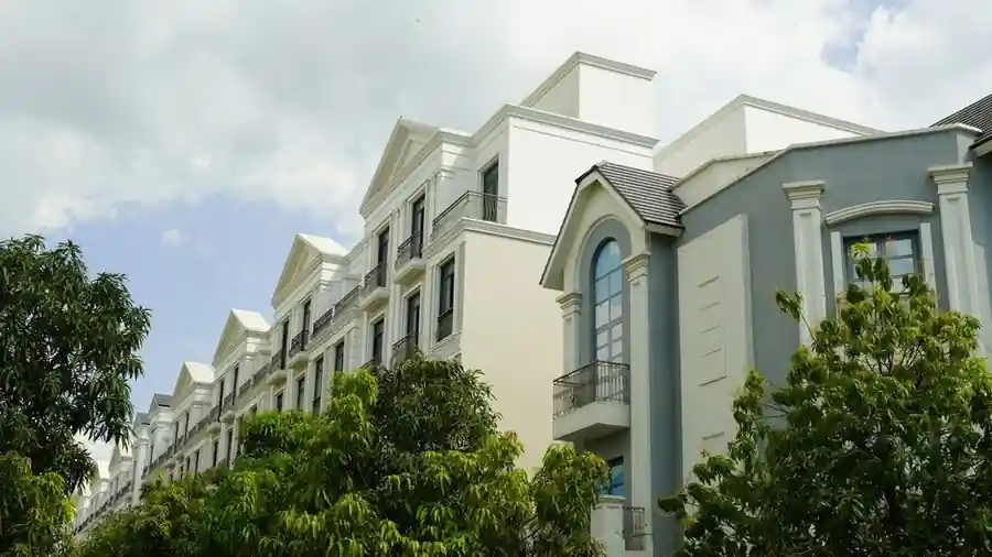 Tree-lined residential street in an upscale Kuala Lumpur neighbourhood